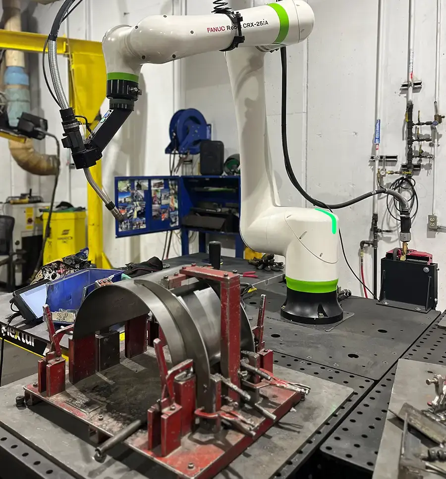 Robotic welding setup using Flextur Modular Cobot Welding Table and fixture at Chief Industries