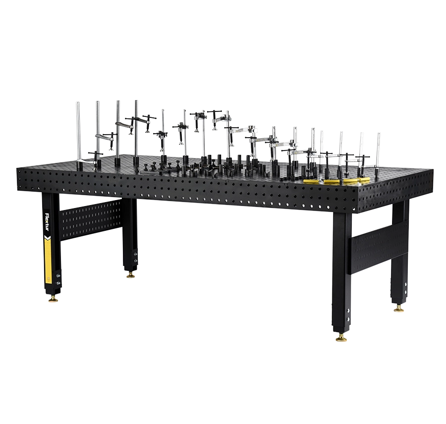 The 48" x 96" x 6" Stationary Nitride Welding Table with 80 Piece Fixturing Kit features a black perforated surface, adjustable clamps and fixtures, and sturdy legs with leveling feet for stability.