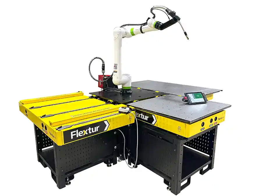 Flextur Cobot Welding Station featuring a collaborative robot arm on a dual yellow workbench with integrated weld system.